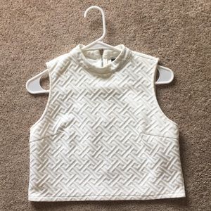 White sleeveless top